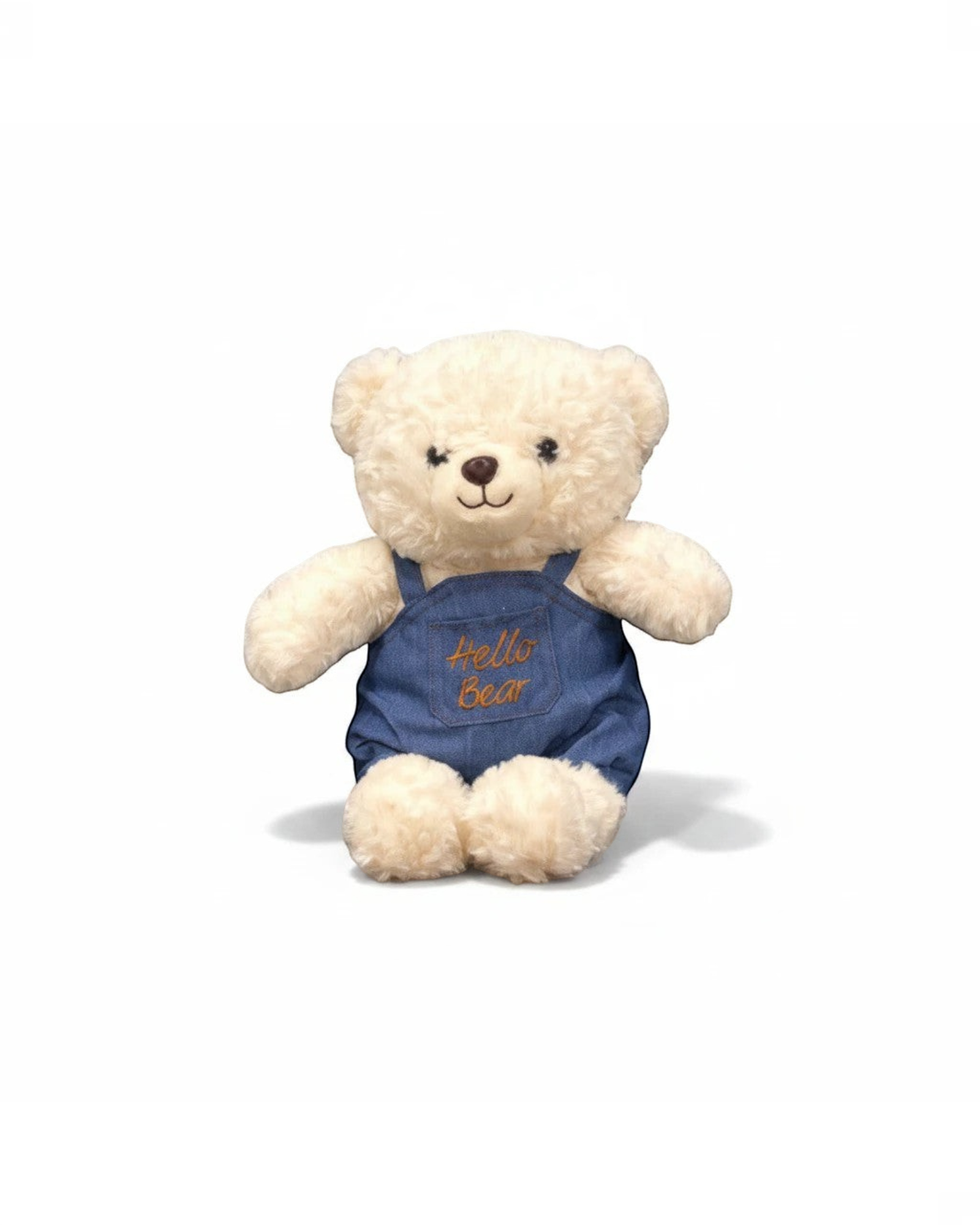 دب محشو ناعم من TagerlSaada بلون كريمي يرتدي وزرة جينز زرقاء مطرزة بعبارة Hello Bear، مثالي كهدية للأطفال.