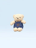 دب محشو ناعم من TagerlSaada بفرو كريمي ووزرة جينز زرقاء مطرزة بعبارة Hello Bear، مثالي كهدية للأطفال.